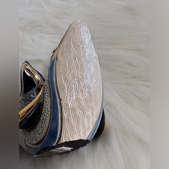 Elegant Blue and Gold Dolphin Sculpture - Picture 6 of 7